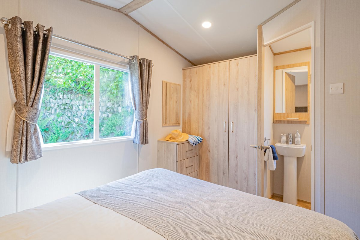 Carnaby Ashdale, master bedroom with window at Praa Sands
