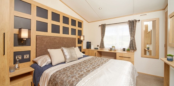 Carnaby Chantry, master bedroom with window at Brokerswood