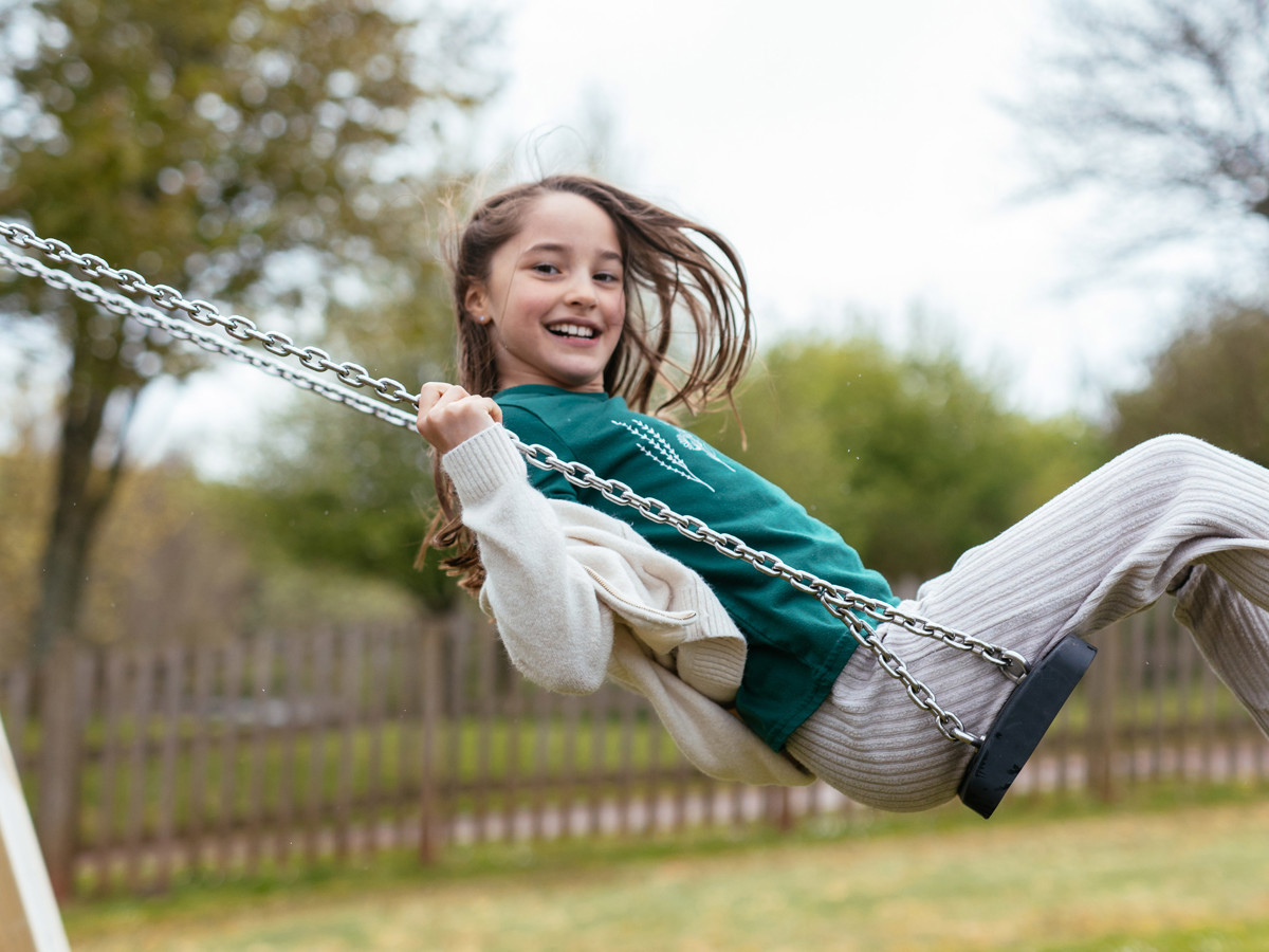 Devon Hills Overview Girl On Swing
