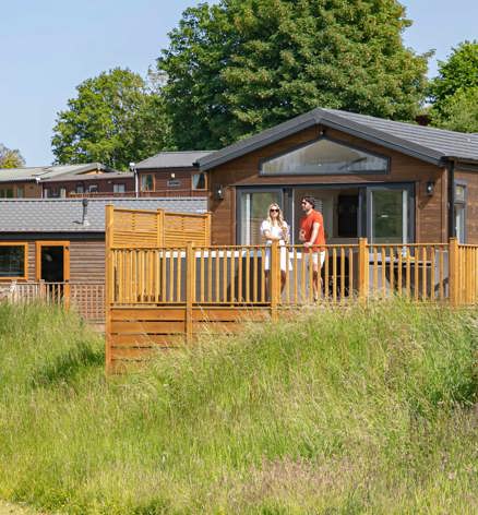 Devon Hills Couple On Decking Standing