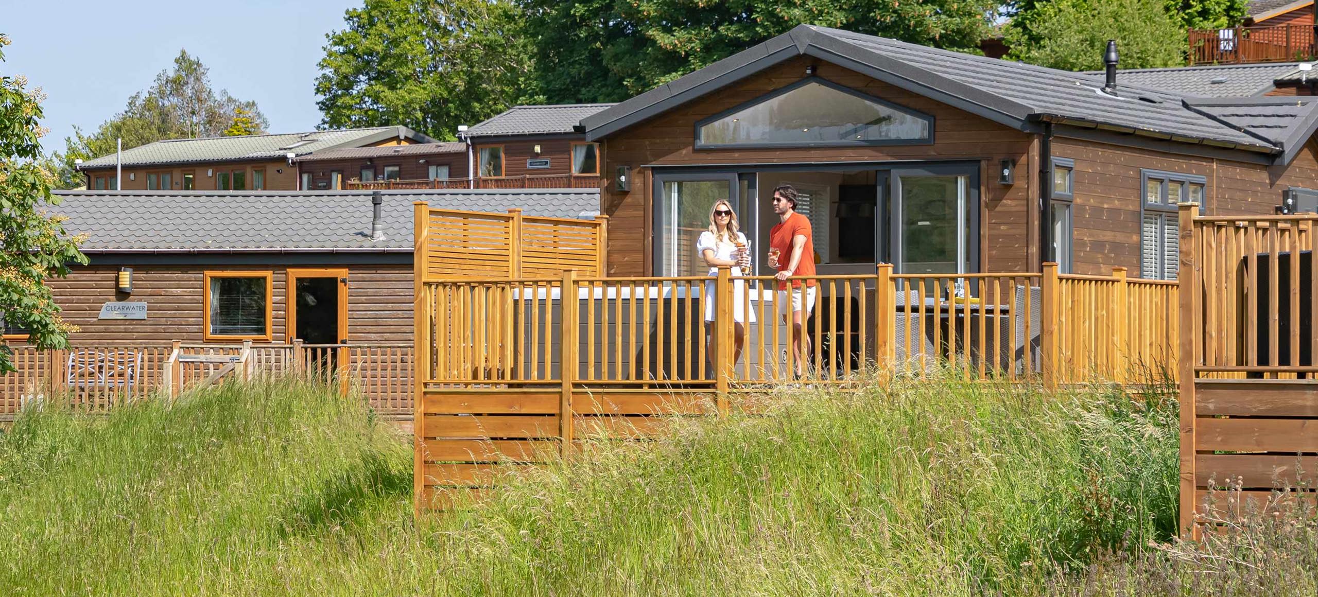 Devon Hills Couple On Decking Standing