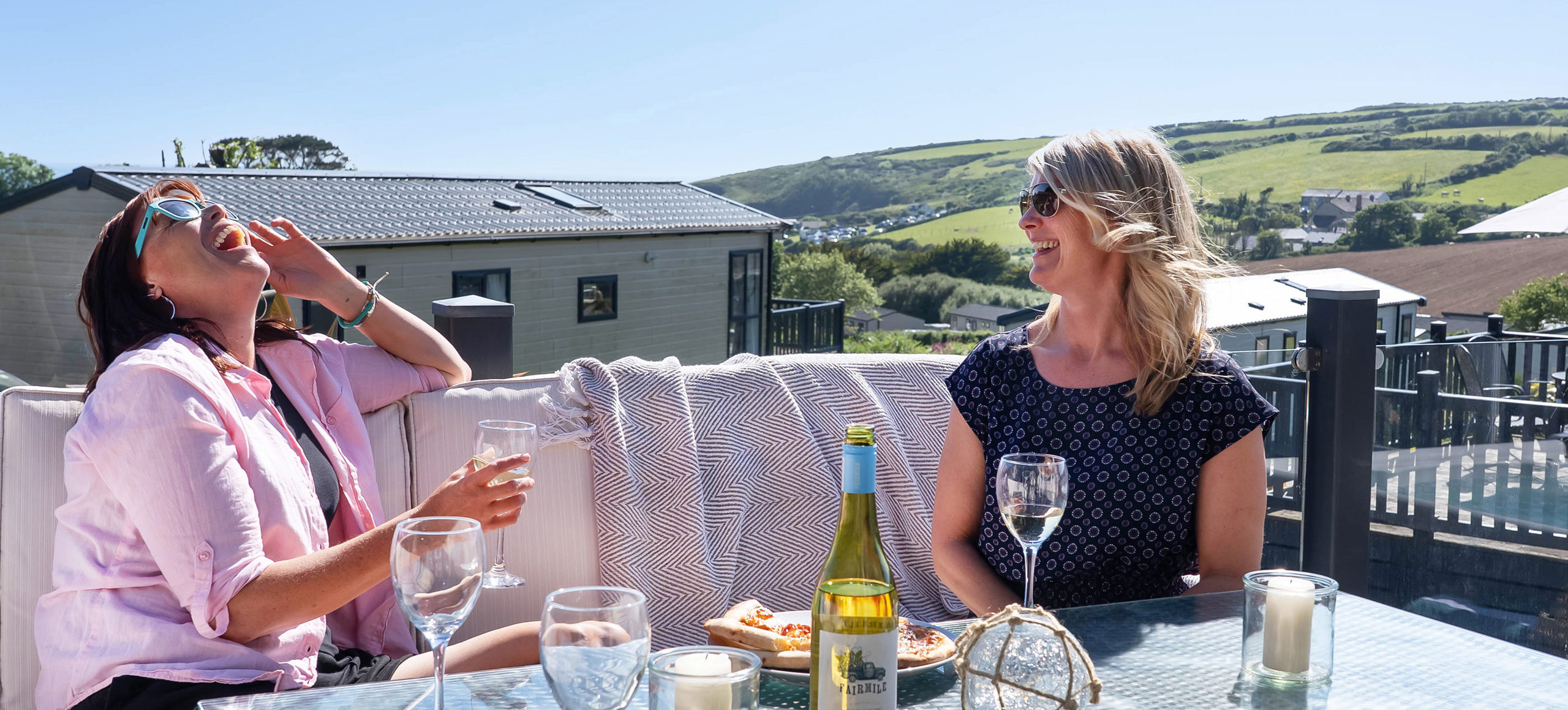 Praa Sands Overview Friends Enjoying Drinks On Decking