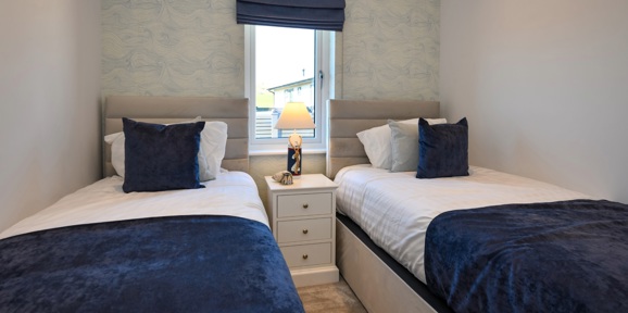 Oakgrove Osprey, blue twin bedroom at The Warren