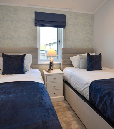 Oakgrove Osprey, blue twin bedroom at The Warren