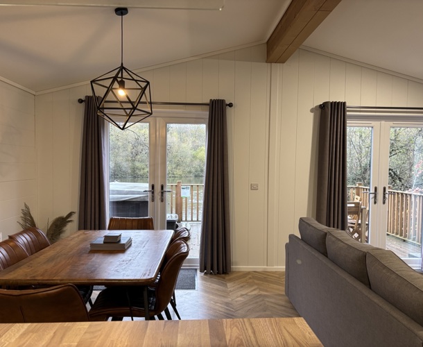 Prestige Dovecote, dining room and patio doors at Brokerswood