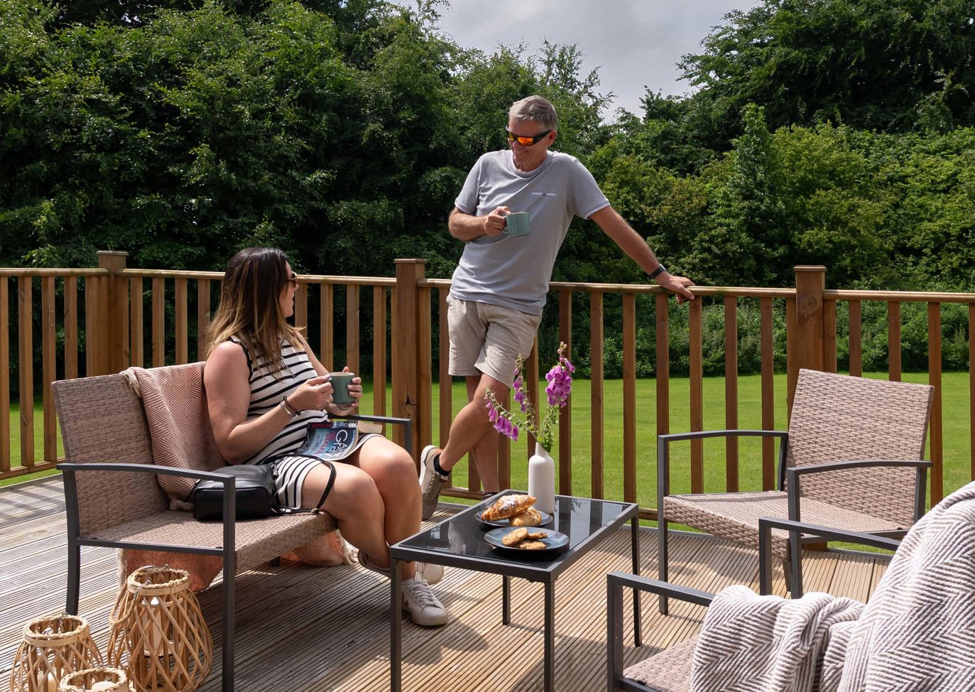 Dartmoor View Couple Talking On Decking