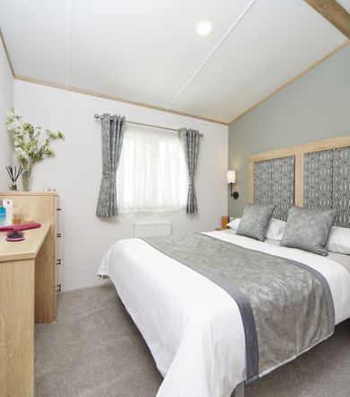 Carnaby Silverdale, master bedroom at Brokerswood