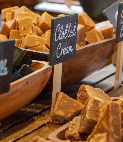 Display of homemade Cornish fudge in flavours like clotted cream and vanilla, near Praa Sands Holiday Park.