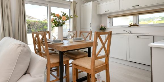 Prestige Oyster Catcher, dining room table at The Warren Resort & Spa