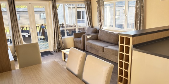 Regal Autograph, living room with patio doors at Finlake