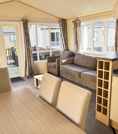 Regal Autograph, living room with patio doors at Finlake