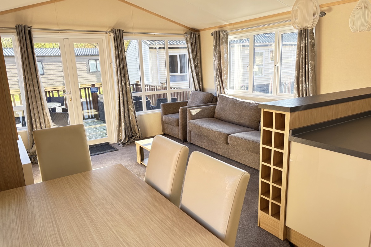 Regal Autograph, living room with patio doors at Finlake