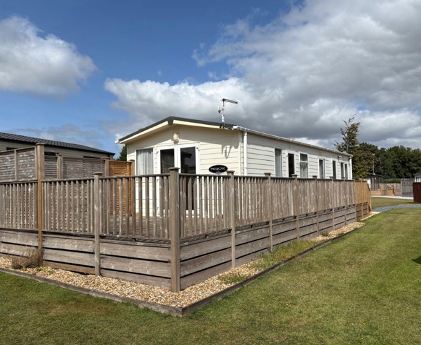 Carnaby Melrose, exterior with decking at Dartmoor View