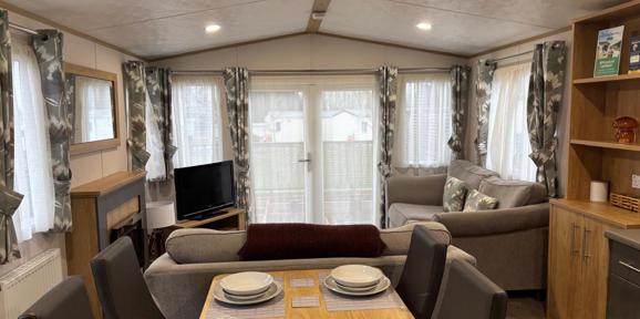 Carnaby Silverdale, living room with patio at Dartmoor View