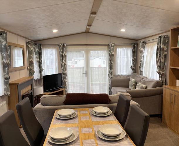 Carnaby Silverdale, living room with patio at Dartmoor View