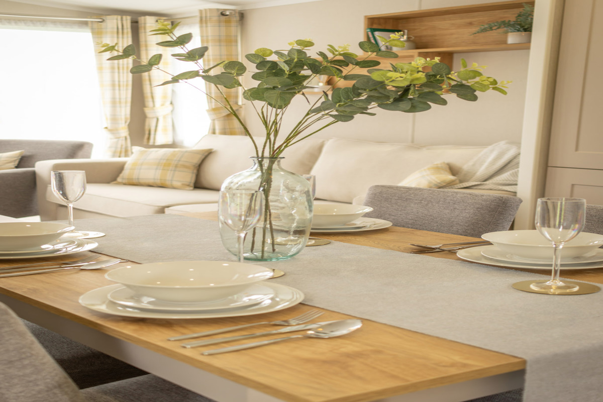 Sunseeker Spirit, dining table with cutlery at Dartmoor View 