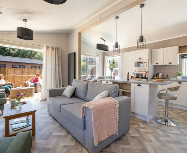 Sunseeker Sensation, living room with open patio door at Finlake