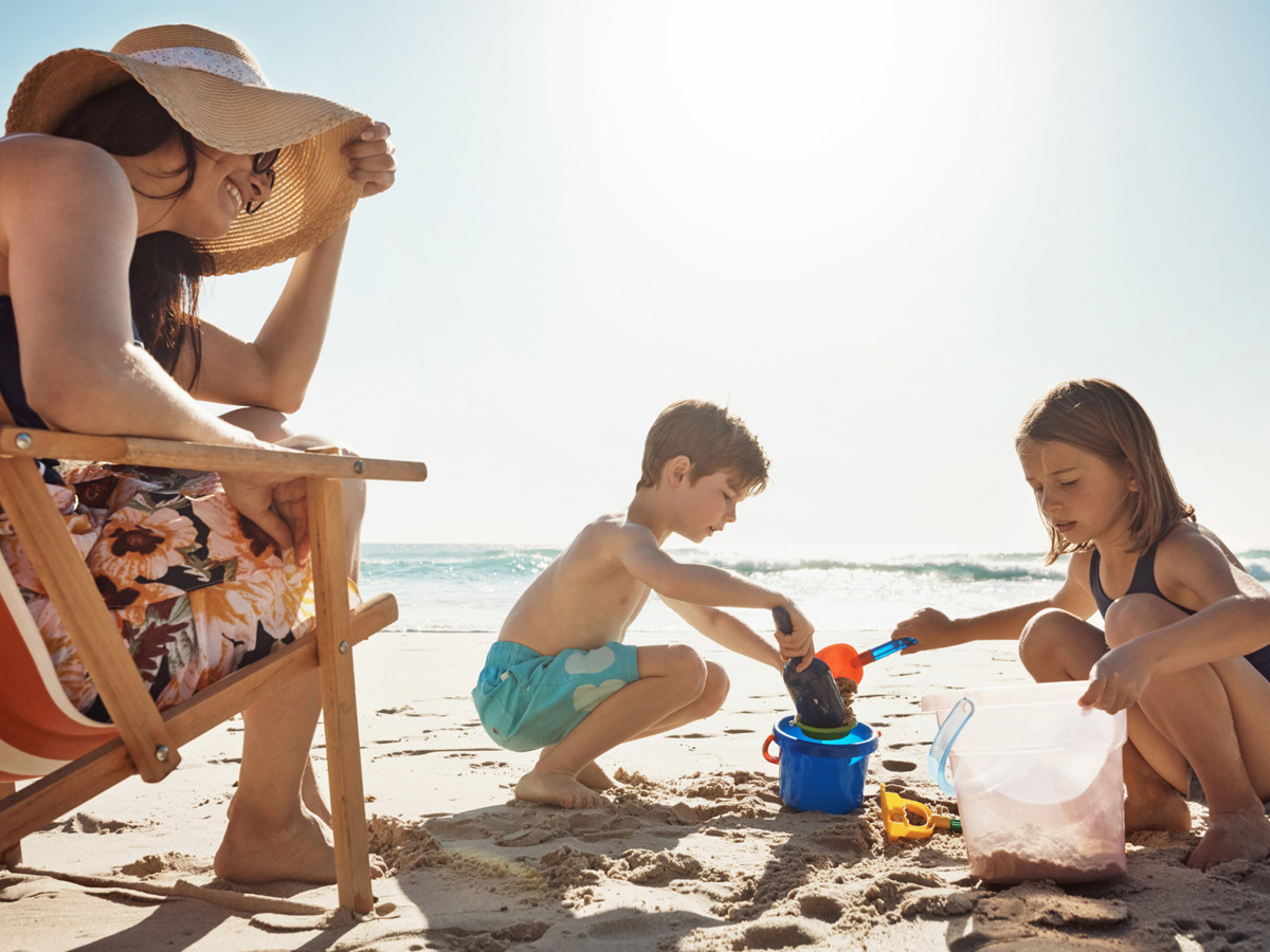 Crugan Local Area Family Playing On Beach