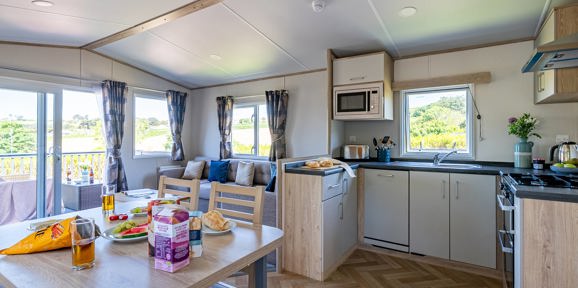 Carnaby Ashdale, dining table and kitchen at Praa Sands