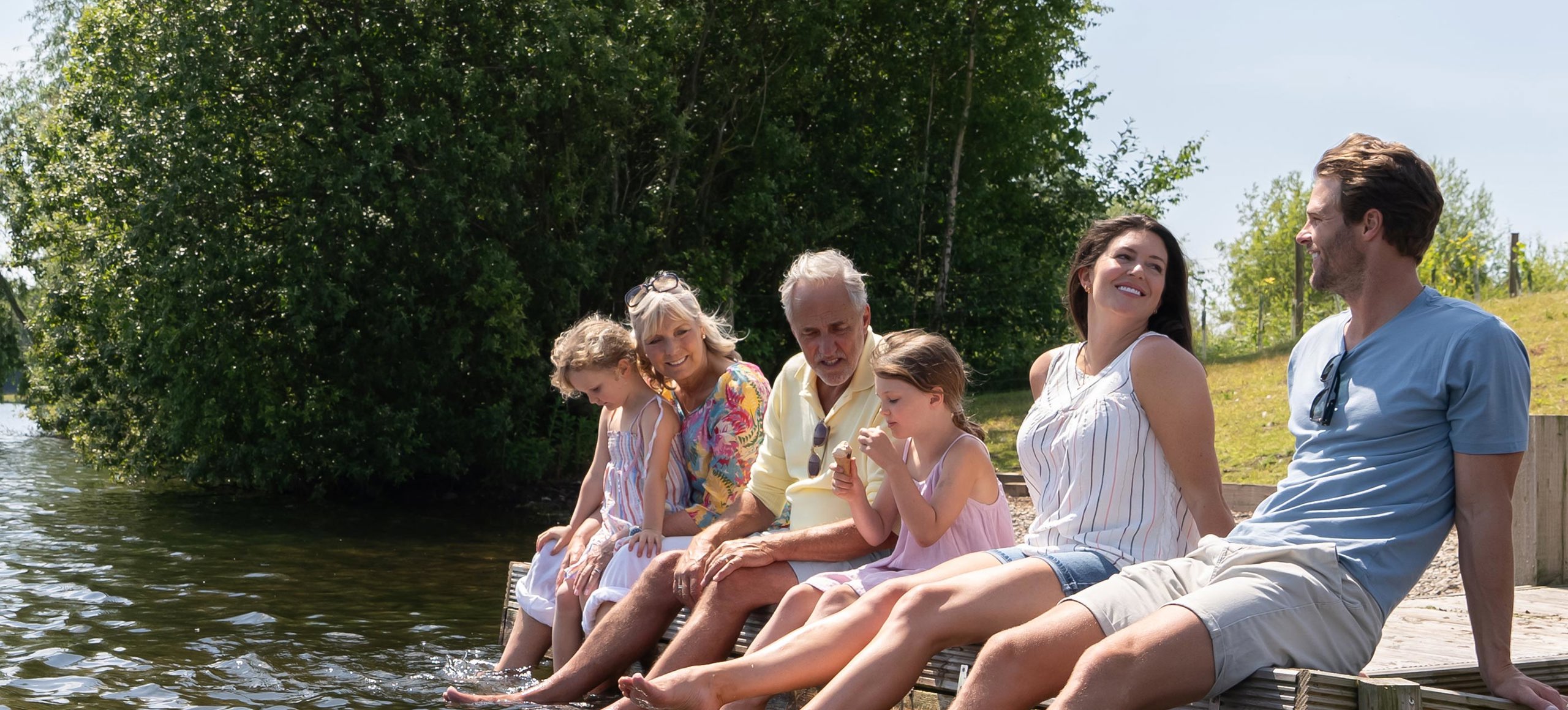 Delamere Family Dipping Toes In Lake
