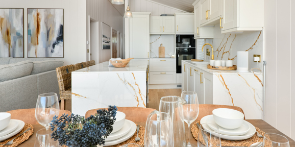 Retreat Coastal, dining table and kitchen at The Warren