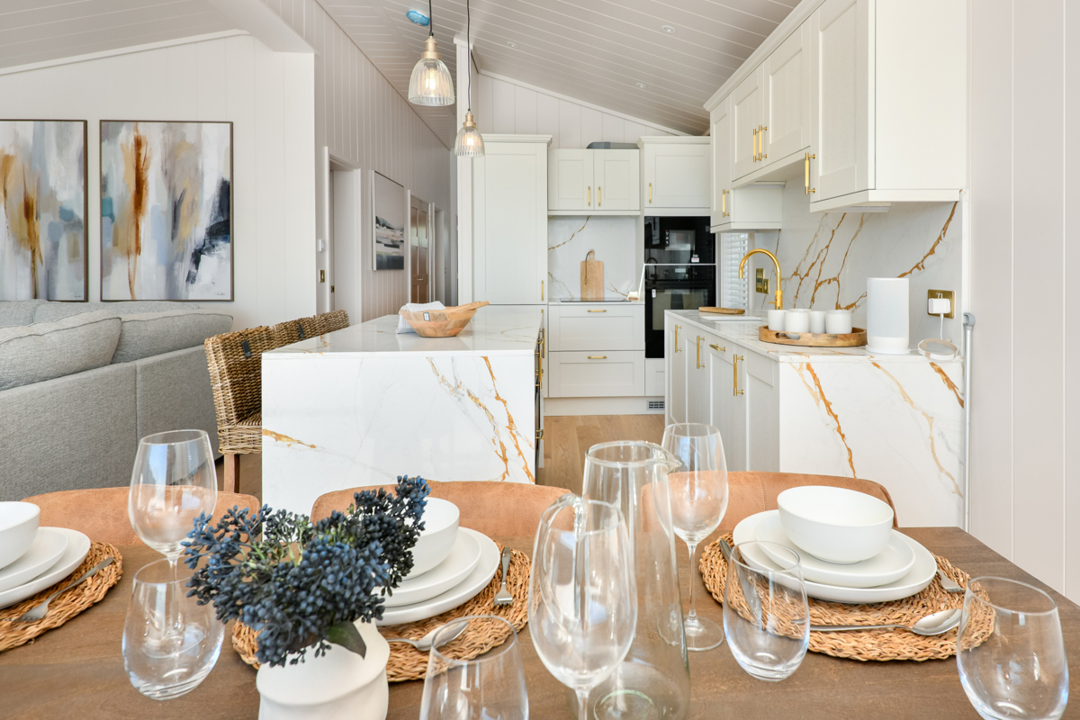 Retreat Coastal, dining table and kitchen at The Warren