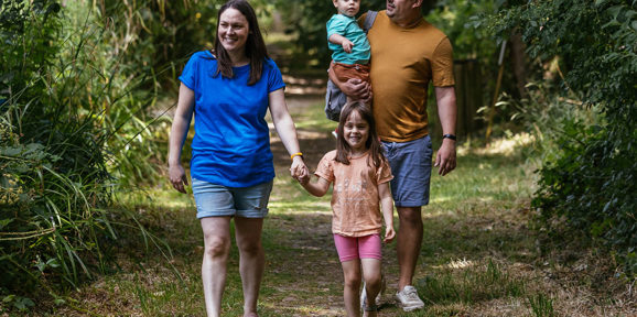 Brokerswood Family Walking Through The Woodland
