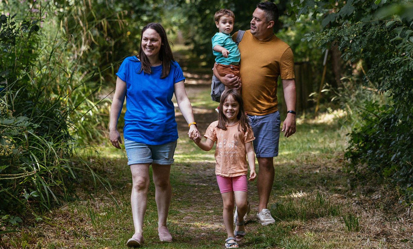 Brokerswood Family Walking Through The Woodland