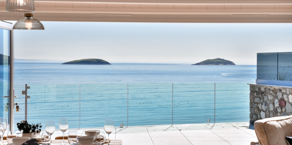 Retreat Coastal, sea view with table at The Warren