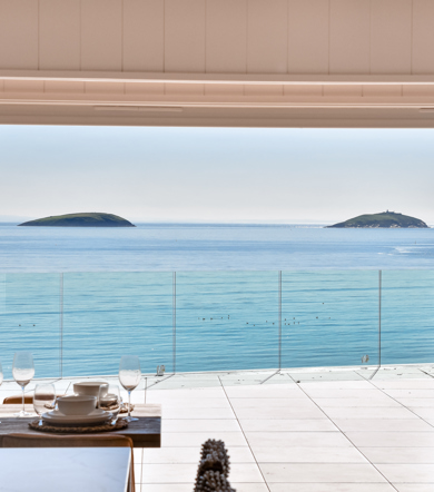 Retreat Coastal, sea view with table at The Warren