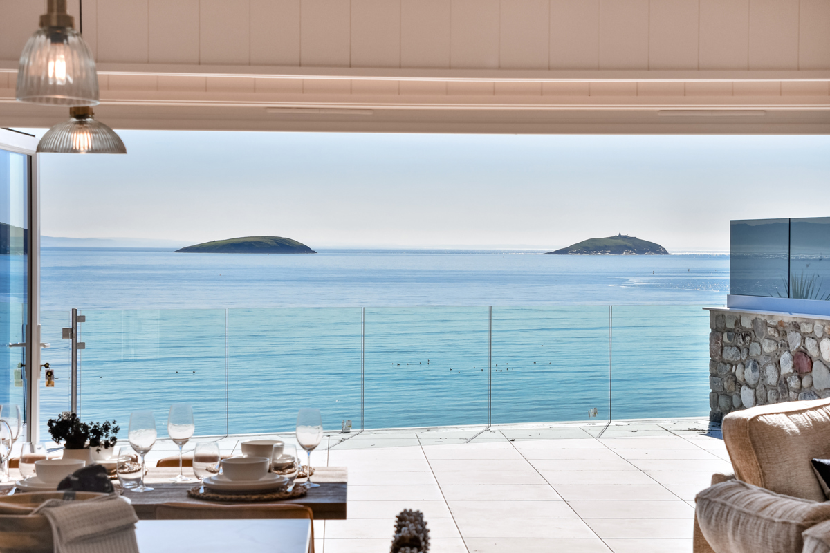 Retreat Coastal, sea view with table at The Warren