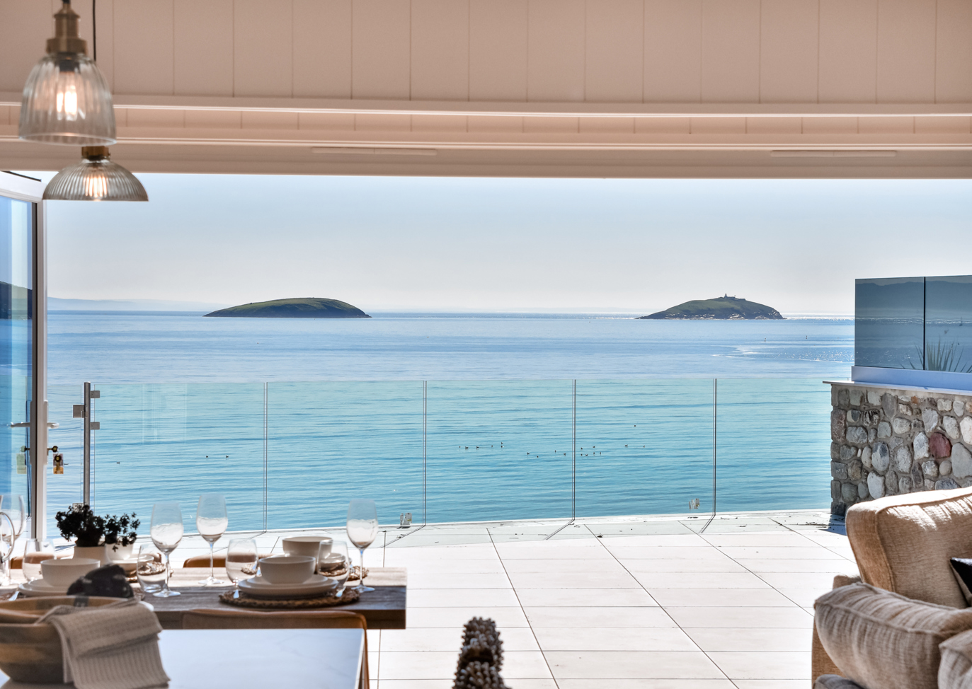 Retreat Coastal, sea view with table at The Warren