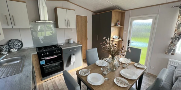 Carnaby Silverdale, dining room table at Talyfan