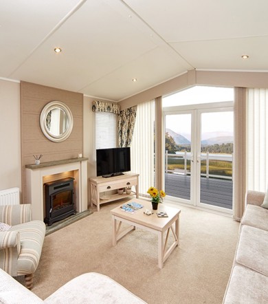 Praa Sands, Carnaby Lakehouse, lounge with patio doors