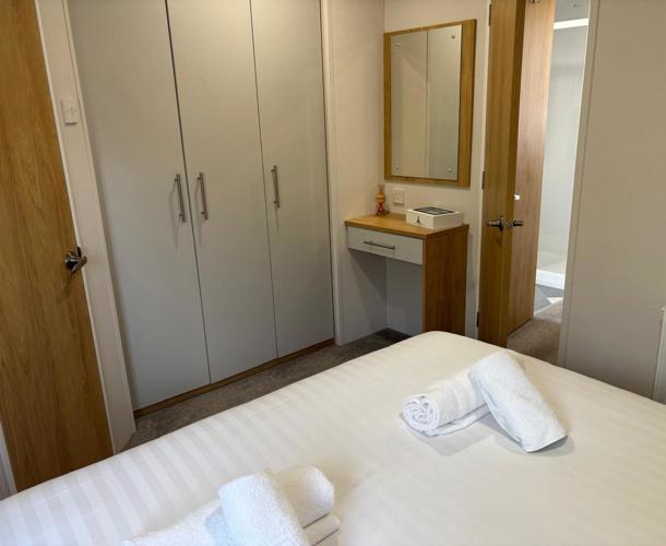 Carnaby Silverdale, master bedroom at Dartmoor View