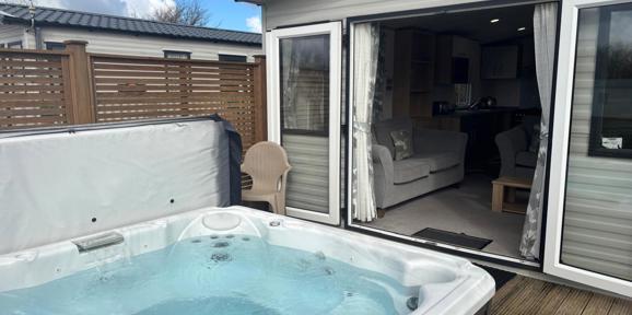 Carnaby Silverdale, hot tub and patio doors at Dartmoor View