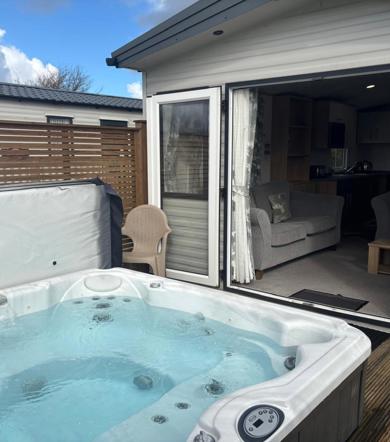 Carnaby Silverdale, hot tub and patio doors at Dartmoor View