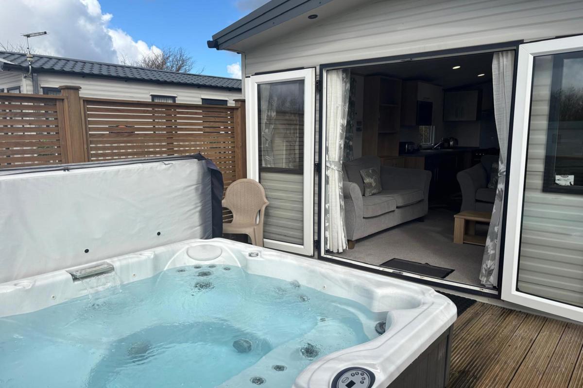 Carnaby Silverdale, hot tub and patio doors at Dartmoor View