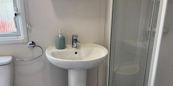 Carnaby Silverdale, bathroom sink at Dartmoor View