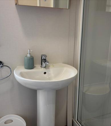 Carnaby Silverdale, bathroom sink at Dartmoor View