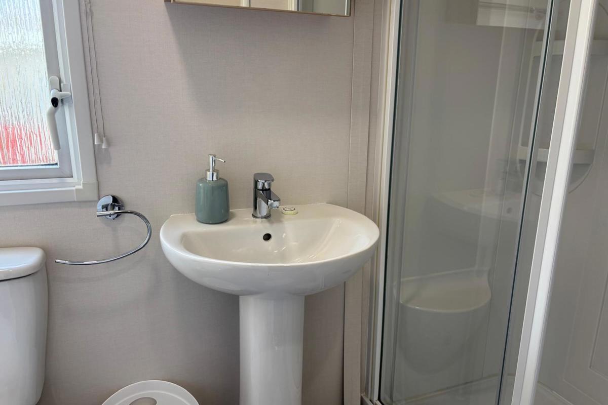 Carnaby Silverdale, bathroom sink at Dartmoor View