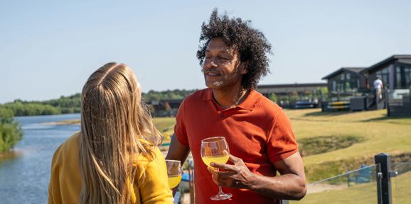 Delamere Couple Talking By Lake