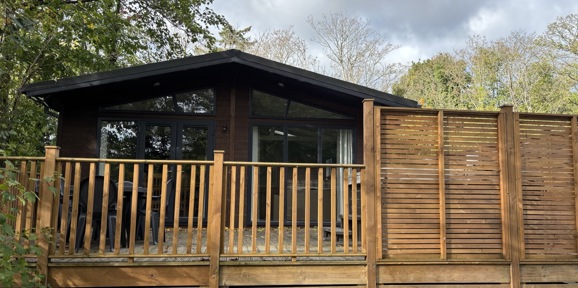 Prestige Foresters, exterior with decking at Brokerswood