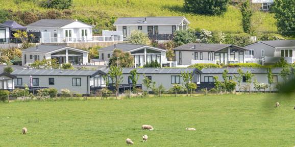 Tal Y Lodges In The Hills And Sheep In The Fields