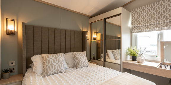 Victory Harraway, master bedroom with mirror at Devon Hills