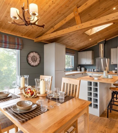 Prestige Foresters, dining area and kitchen at Brokerswood
