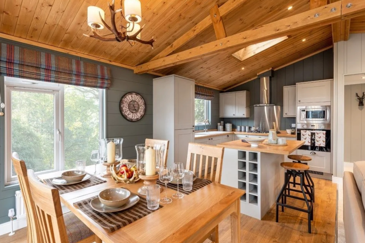 Prestige Foresters, dining area and kitchen at Brokerswood