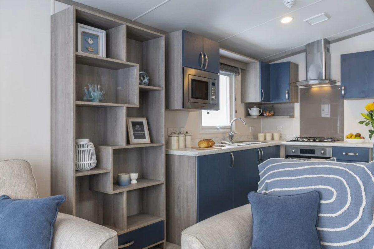 Regal Retreat, shelving in living room at Finlake