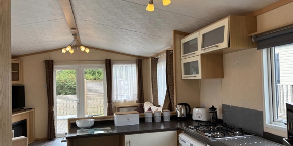 Carnaby Melrose, patio doors in living area at Dartmoor View