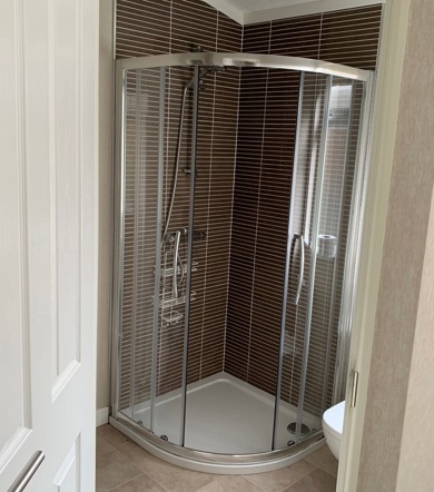 Omar Westfield, shower through doorway at Finlake